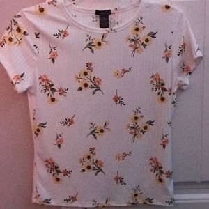 White shirt w/ yellow and orange flowers